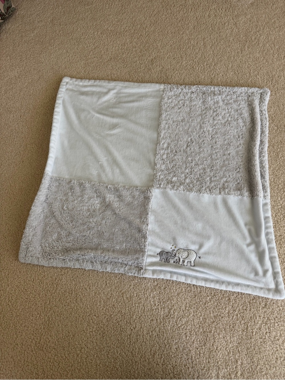 gray and white patchwork baby blanket